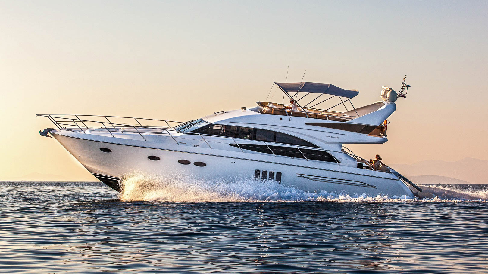 Luxury yacht Benetti Happy Me sunset port side