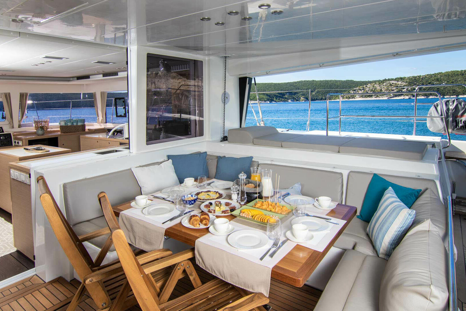 Luxury catamaran Lagoon 560 S2 aft dining area