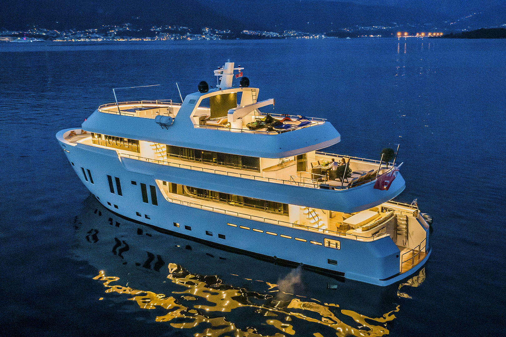 Luxury yacht Apna portside night view