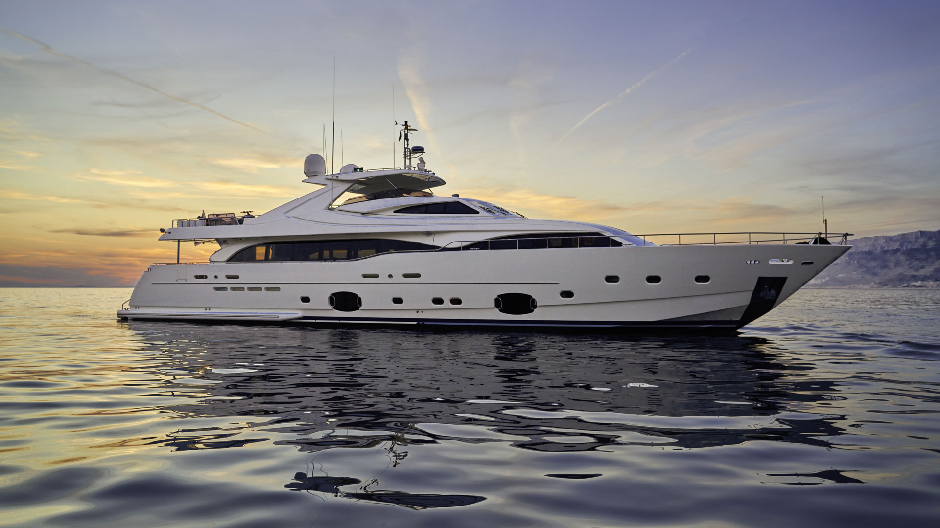 Luxury yacht Benetti Happy Me sunset port side