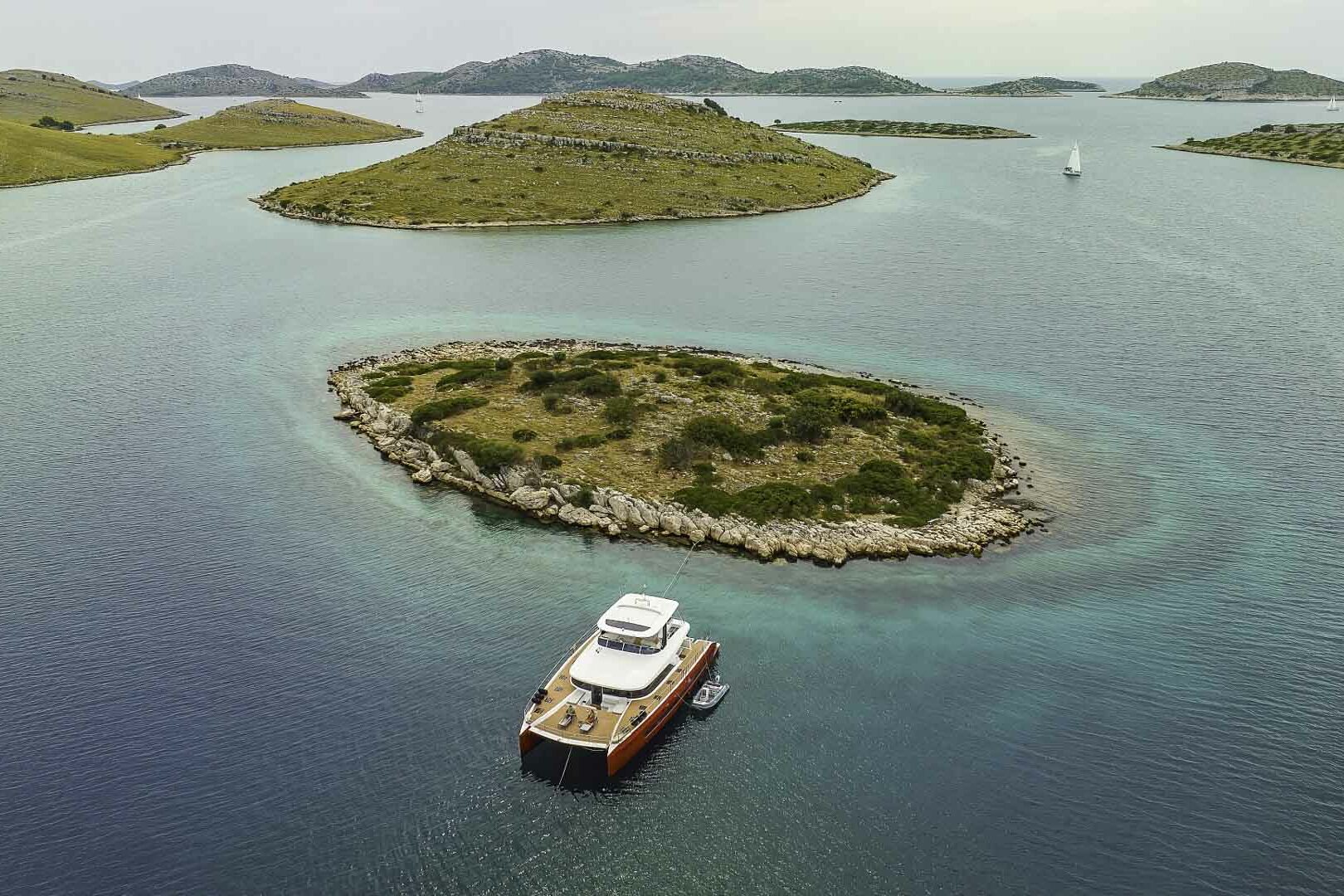 Luxury catamaran Lagoon Sixty 7 anchored in Kornati archipelago