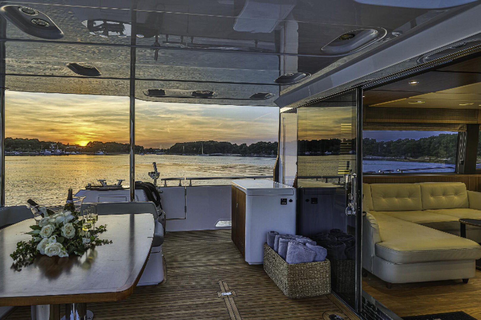 Luxury yacht Bollinger aft area sunset