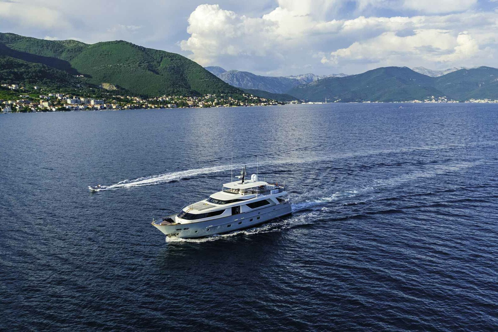 Luxury yacht VALENTINA II cruising with tender