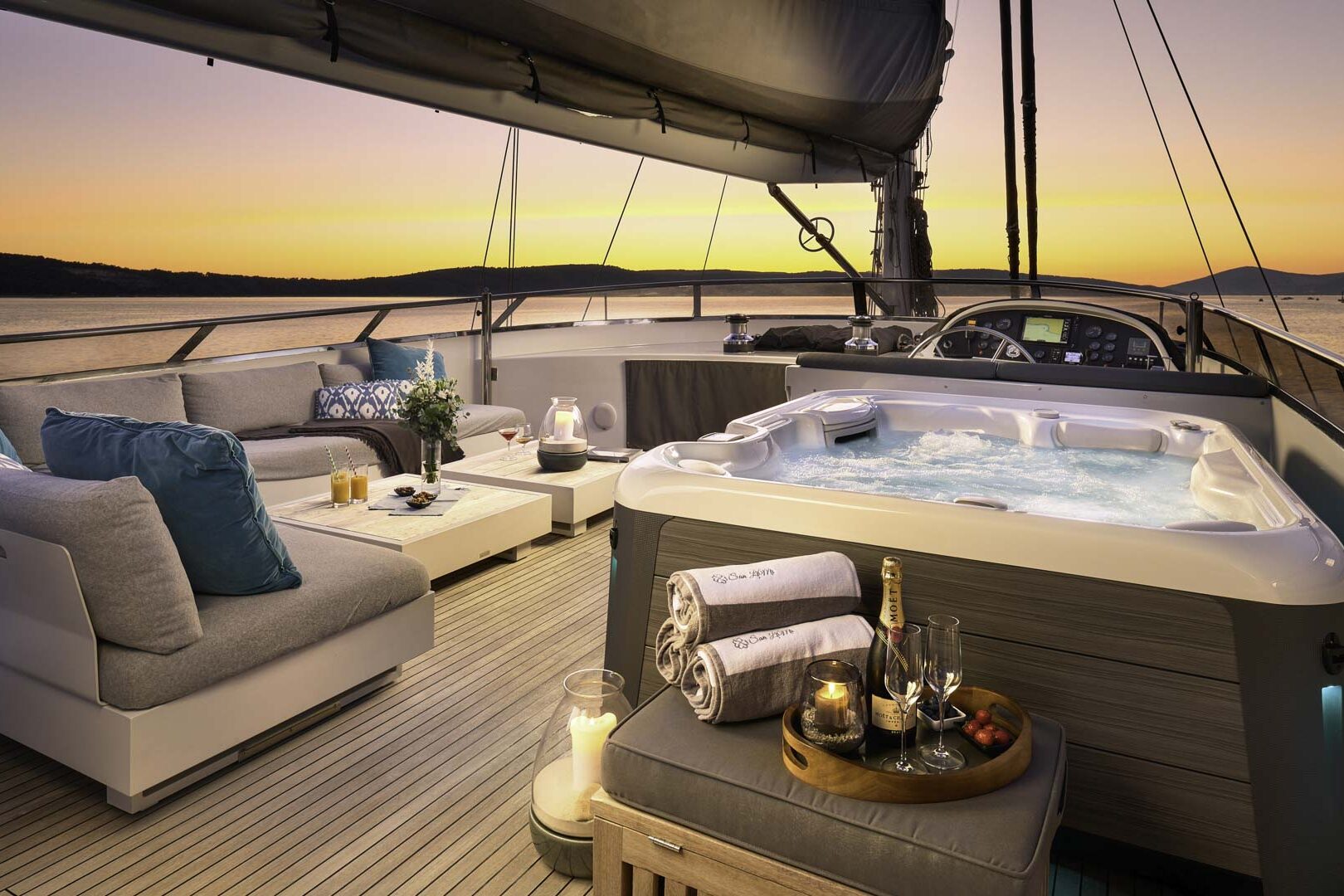 Luxury sailing yacht San Limi deck seating area at night