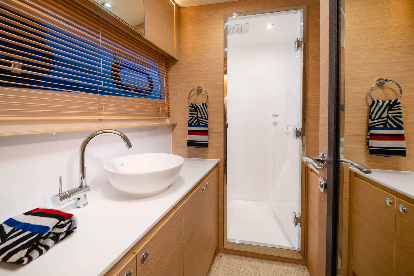 A spacious and luxurious bathroom on board the Aquila 54 luxury power catamaran, 'By My Side'.
