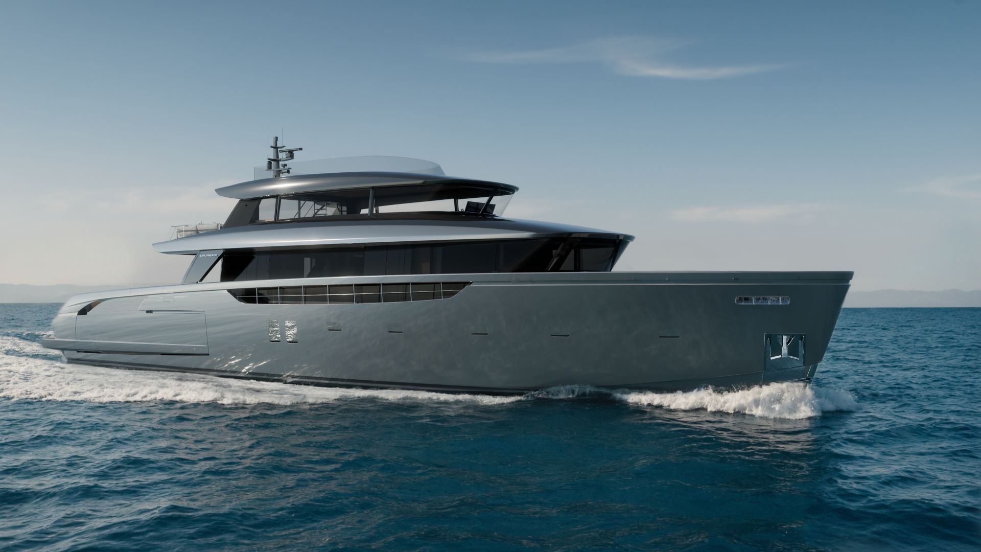 Side profile of Sanlorenzo SX120 cruising at sea, showcasing sleek lines and spacious decks